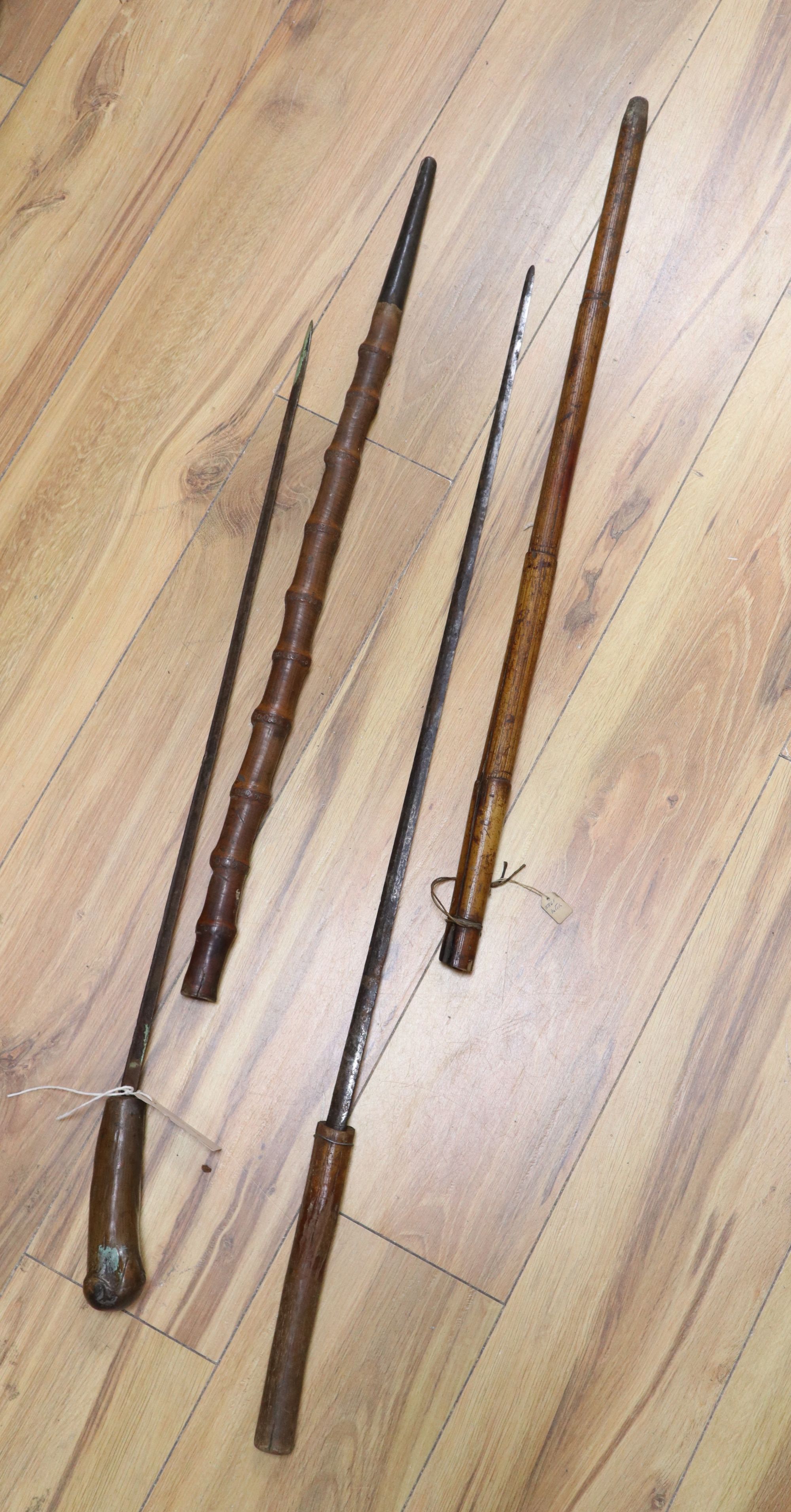 Two bamboo sword sticks, longest 94cm